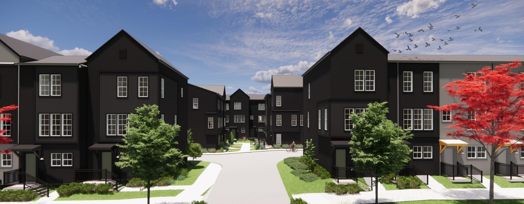 a row of apartments with trees and landscaping